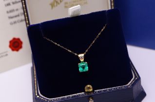 1.14CT COLUMBIAN EMERALD PENDANT in 18CT YELLOW GOLD with DIAMOND SET BALE