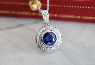 1.96CT SAPPHIRE & DIAMOND PENDANT; in 18CT WHITE GOLD