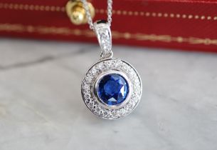 1.96CT SAPPHIRE & DIAMOND PENDANT; in 18CT WHITE GOLD