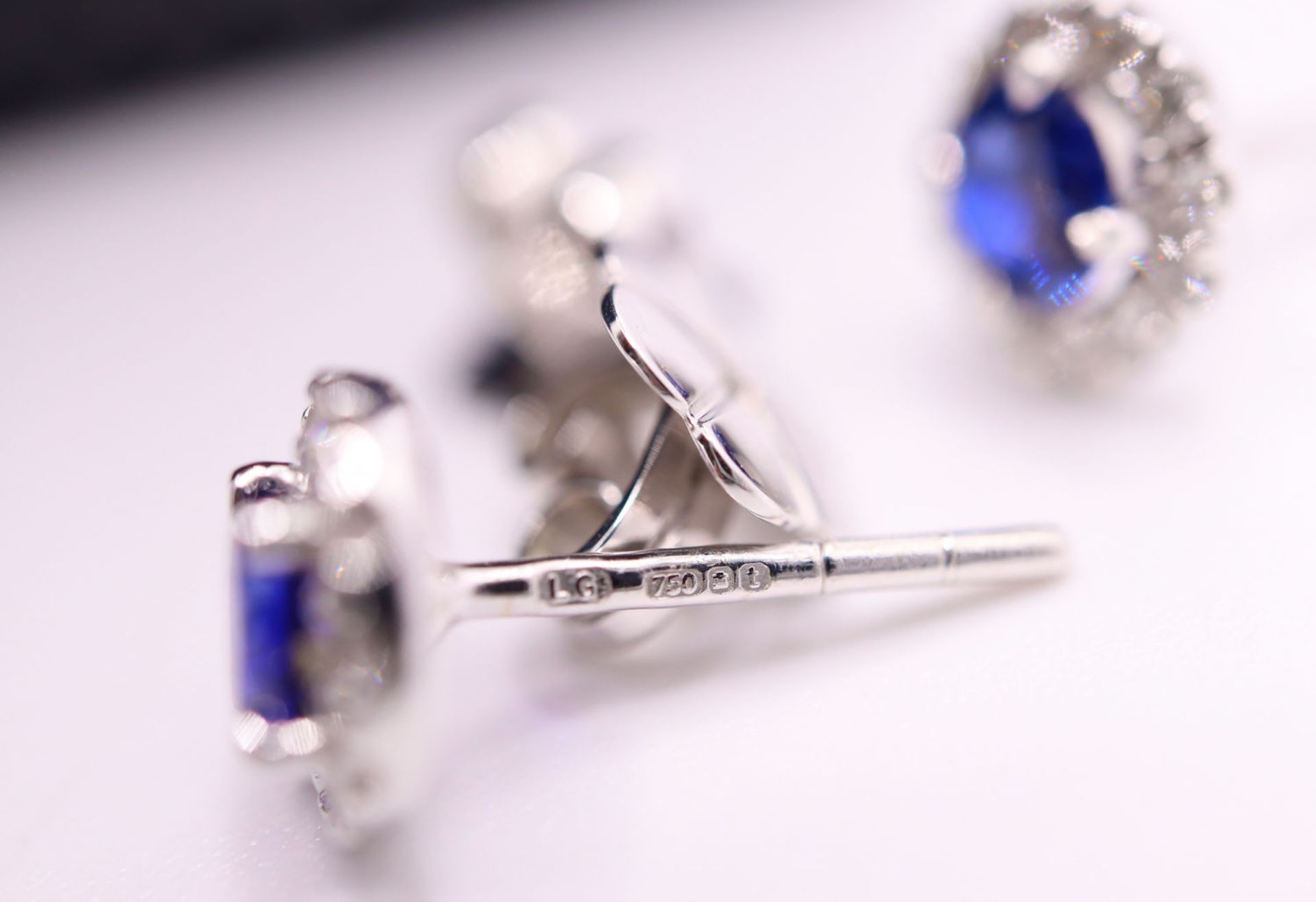 18K WHITE GOLD - 1.01CT SAPPHIRE & DIAMOND STUD EARRINGS; with LAINGS Original Receipt / Certificate - Image 3 of 8