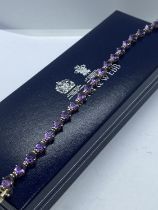 AMETHYST SET TENNIS BRACELET SET IN WHITE METAL - APPROX 7" LONG