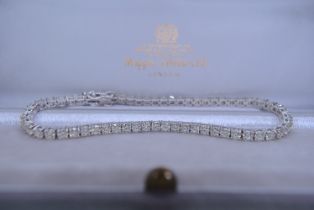 *STUNNING* 5.69CT *VVS/ E-F* DIAMOND BRILLIANT CUT 18CT WHITE GOLD TENNIS BRACELET (£18,950.00 CERT)
