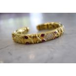 18CT YELLOW GOLD - DIAMOND & RUBY BANGLE / BRACELET (67g)