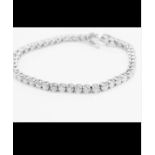 18ct GOLD 9.00ct DIAMOND TENNIS BRACELET - APPROX SI1/SI2 CLARITY & G/H COLOUR - 7" LONG