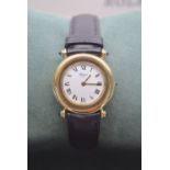 CHOPARD 18K GOLD LADIES WATCH (WHITE DIAL, SIGNED CLASP ON BLACK STRAP)