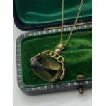 ANTIQUE 9ct GOLD SMOKY QUARTZ SPINNER PENDANT WITH ANTIQUE CHAIN OF APPROX. CHAIN LENGTH 18'