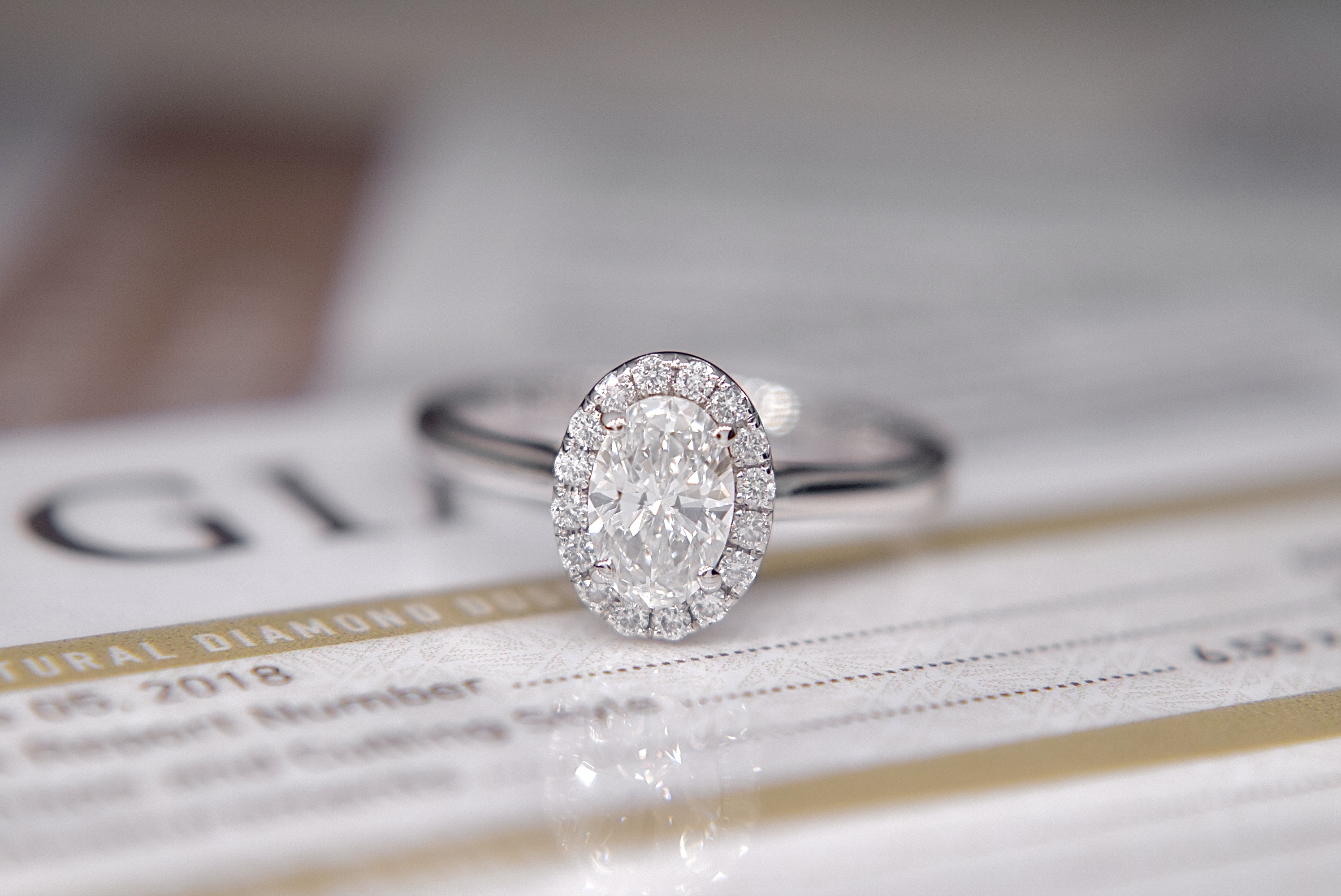 GIA DIAMOND PLATINUM HALO OVAL RING - WITH GIA DIAMOND DOSSIER CERT/ £4,995.00 VALUATION & BOX - Image 8 of 14