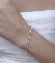 2.86CT DIAMOND TENNIS BRACELET IN WHITE GOLD (SI CLARITY/ F COLOUR) £5,000.00 VALUATION CERTIFICATE