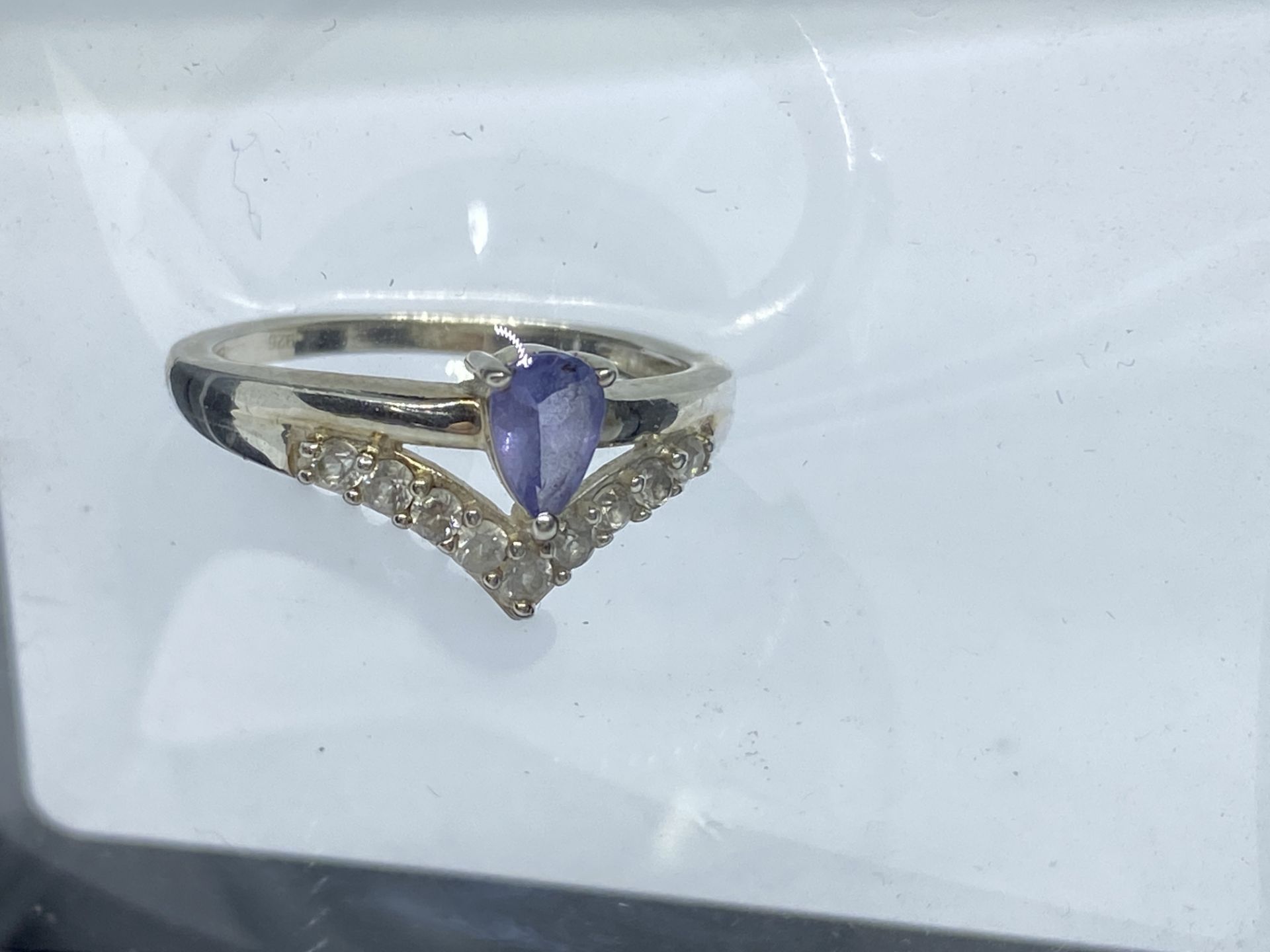 TANZANITE & ZIRCON SET RING IN WHITE METAL