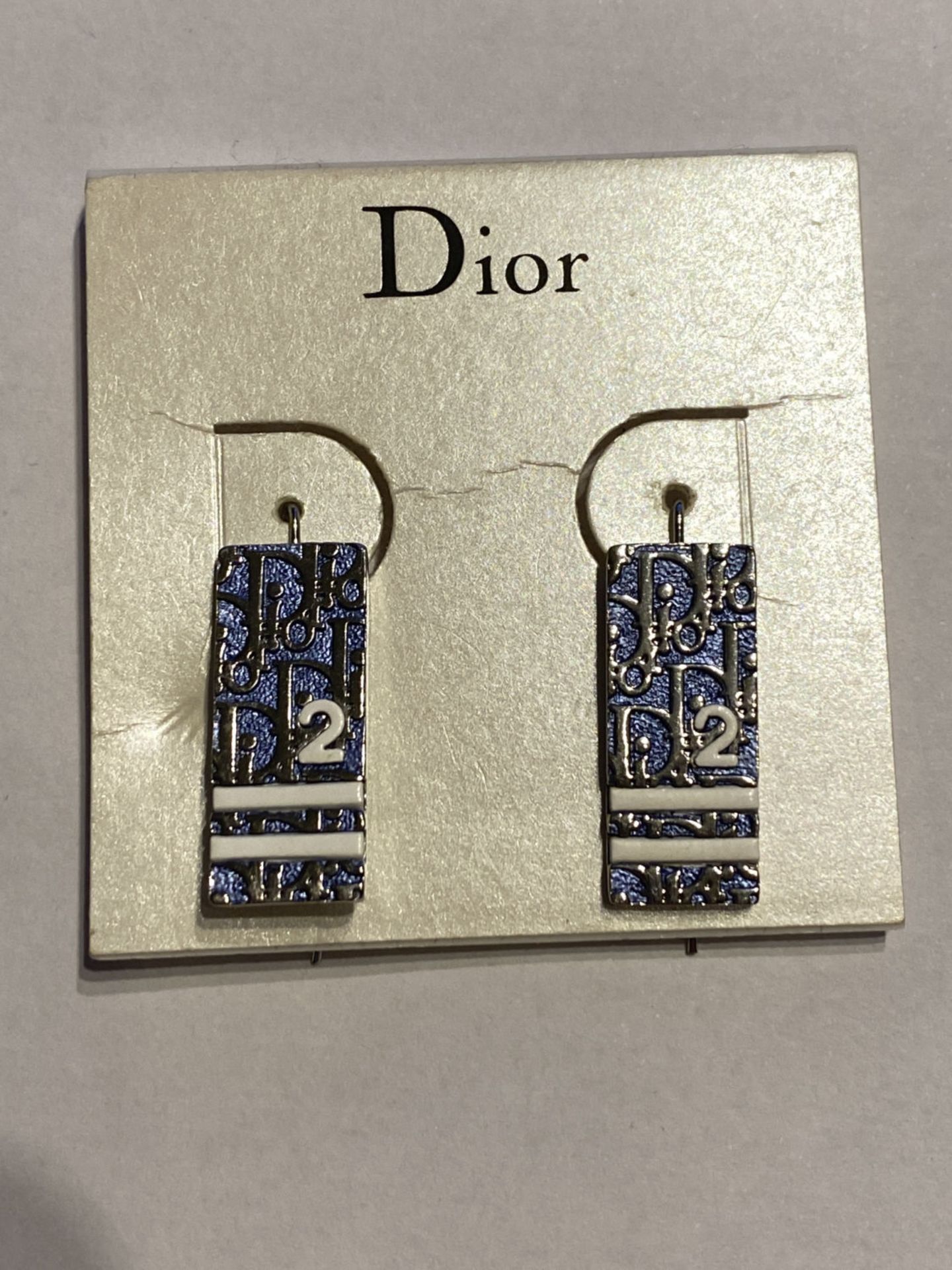 VINTAGE DIOR EARRINGS ON ORIGINAL SHOP CARD DISPLAY