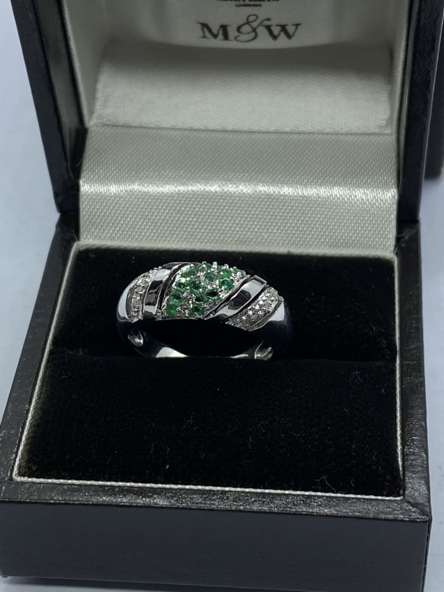 14CT WHITE GOLD EMERALD & DIAMOND RING