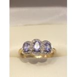 9ct GOLD 3 STONE TANZANITE & DIAMOND TRIPLE DAISY RING