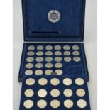 DDR-Münzen in Sammelbox