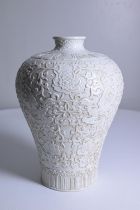 Chinese white glaze molded vase