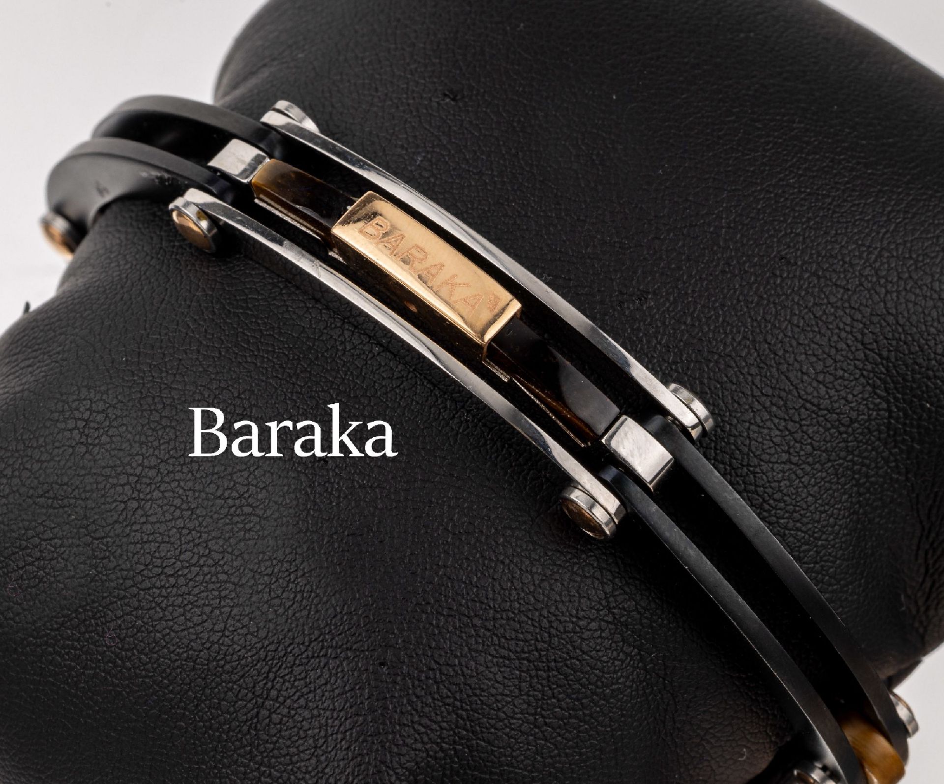 BARAKA Armband mit Tigerauge,   GG 750/000 und Stahl, z.T.