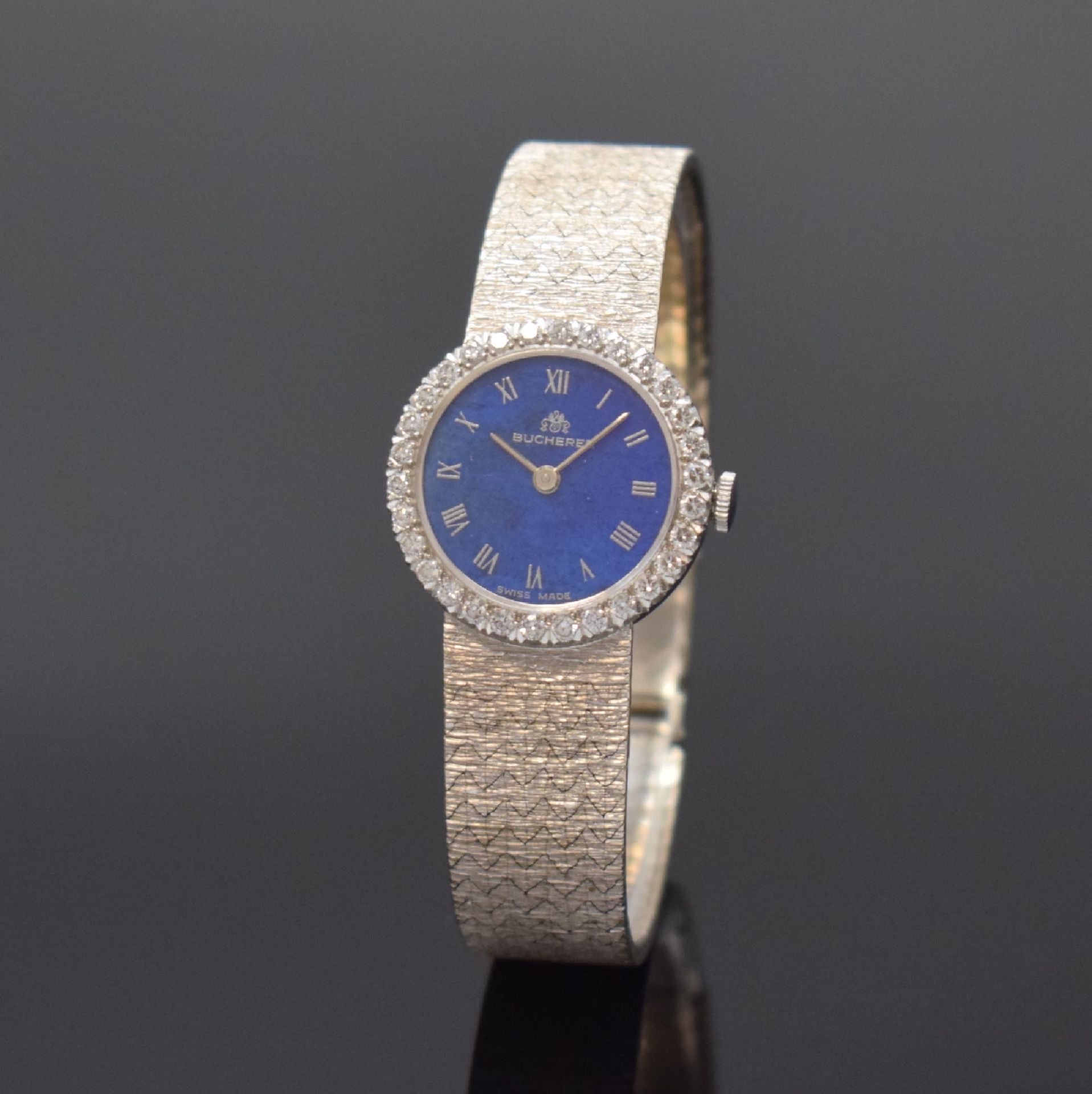 BUCHERER Damenschmuckuhr in WG 585/000 mit Diamanten,