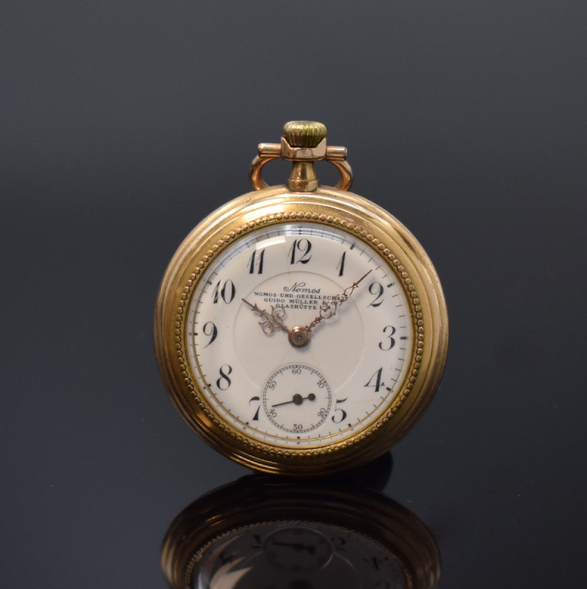 NOMOS offene vergoldete Taschenuhr, Deutschland um 1910,