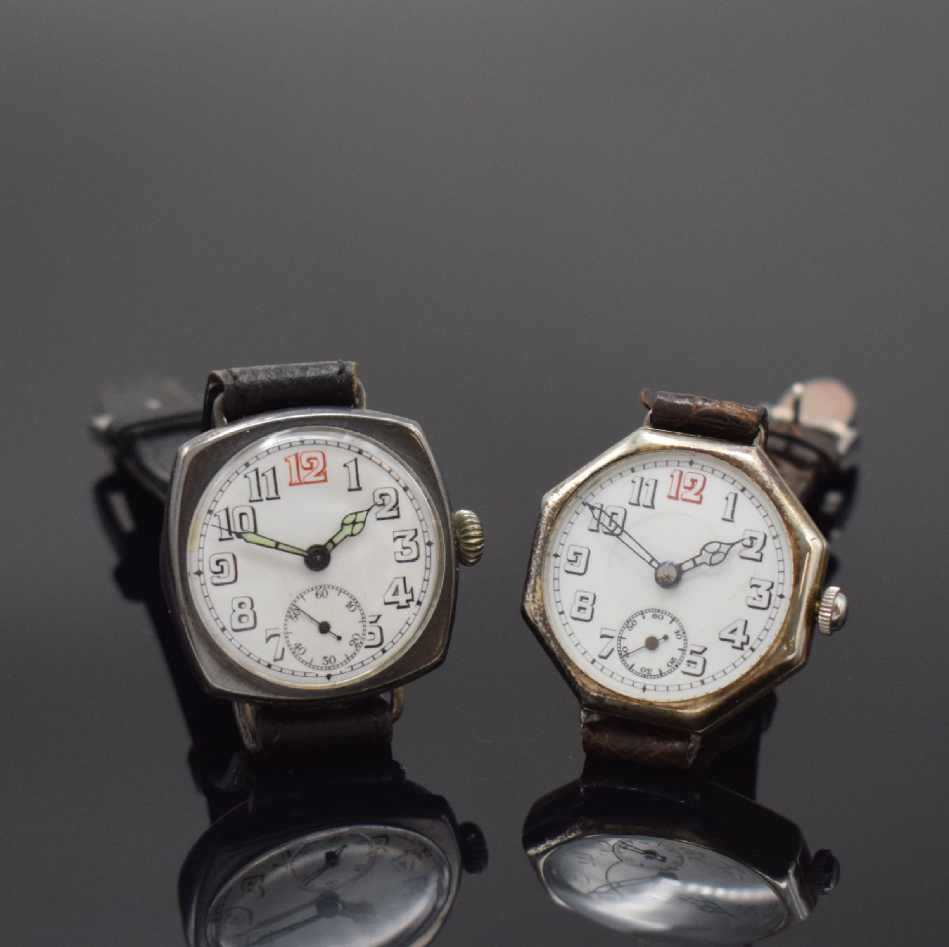 2 frühe Armbanduhren mit Emailzifferblättern in Silber /