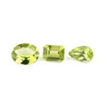 Lot 18 lose Peridots, ca. 22.10 ct, versch.Schliffformen