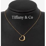 18 kt Gold TIFFANY & CO Diamant-Anhänger an Kette, GG