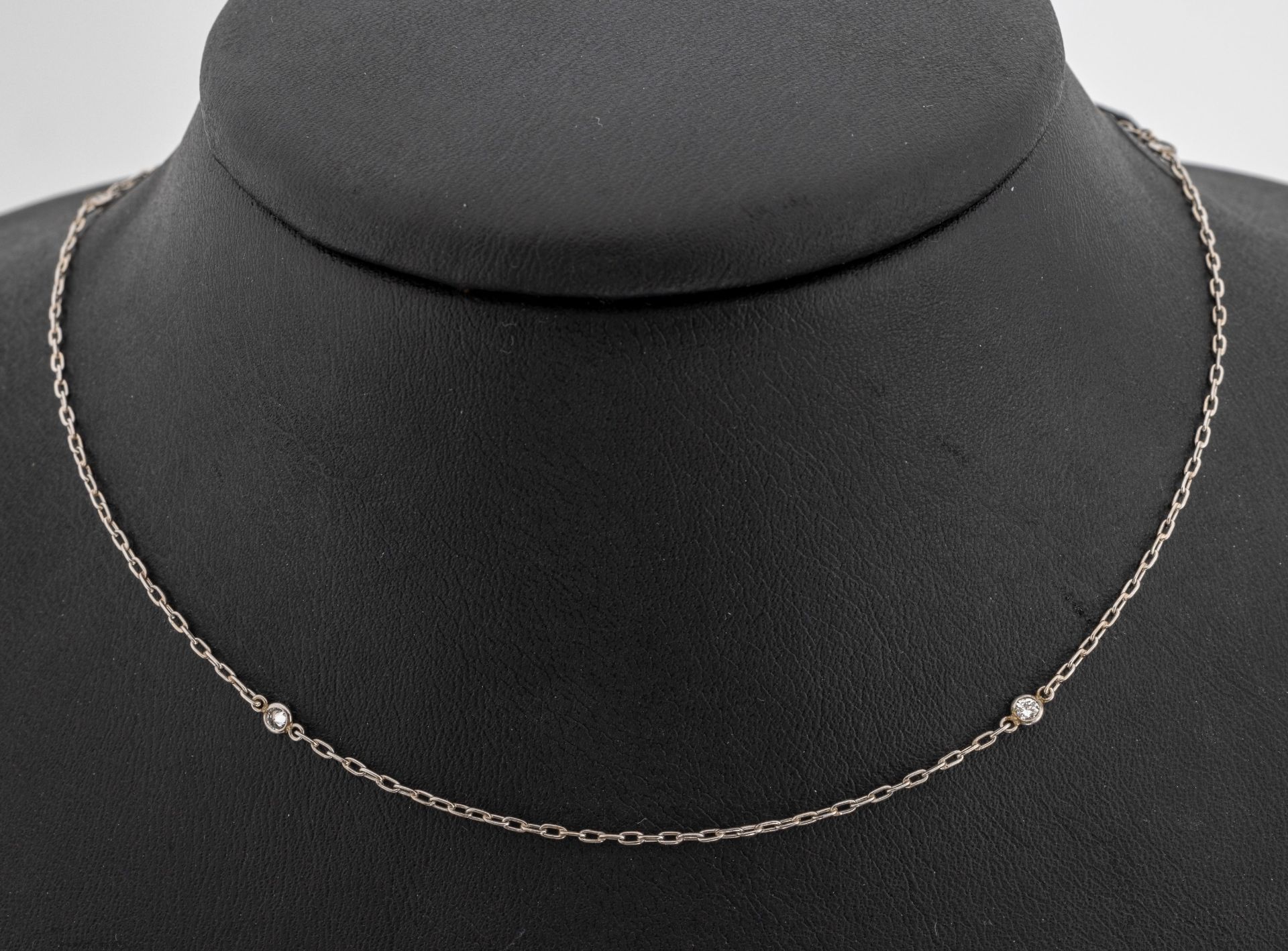 Platin Brillant-Collier, um 1930, Pt gepr.,6 Brillanten in