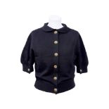 CHANEL Black cashmere sweater with decorative buttons on the back