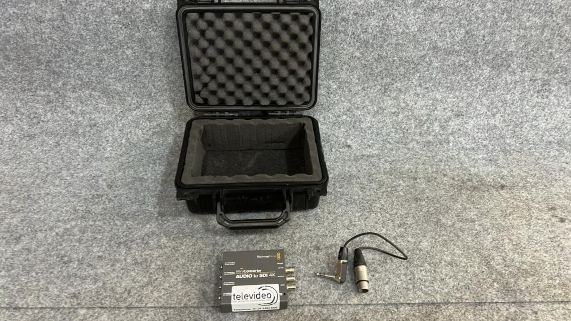 Black magic mini converter-Audio to SDI 4k contained in small plastic flight case with lead Blackmag