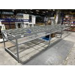 1, Steel fabricated window frame assembly bench. Fitted with anti-scratch bristle tops and lower she