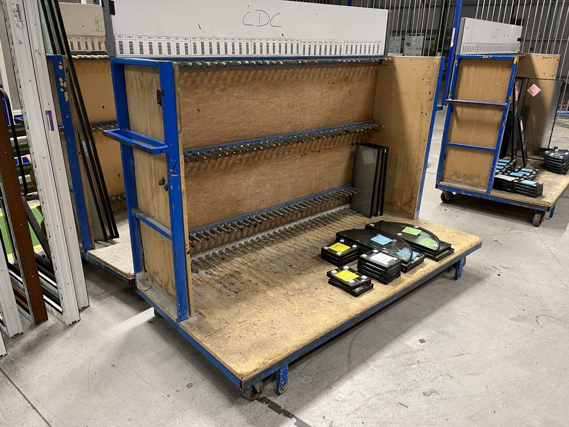 4, Steel fabricated double glazed glass unit storage trolleys. 40 locations. Approx size 2.1Wx1Dx1.7