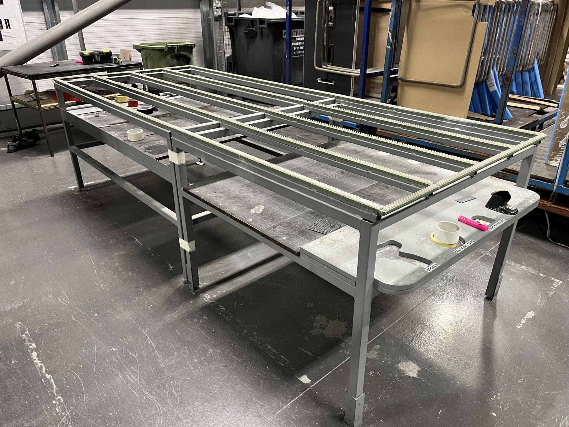 2, Sreel fabricated assembly benches with shelves. Approx sizes 1 @ 3mx12m, 1 @ 3.75mx1.2mtrs