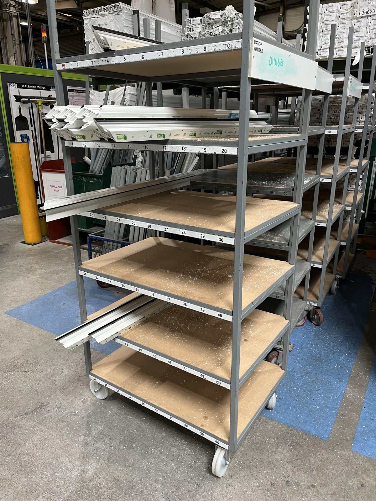 11, Steel fabricated 8 shelf uPVC sash profile storage trolleys