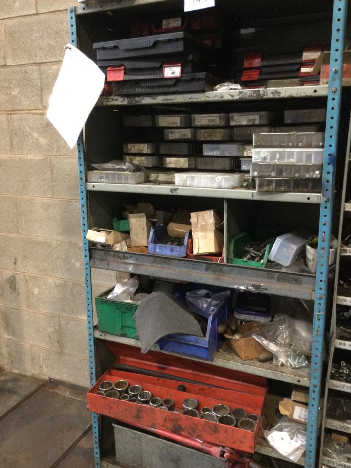 Contents Of Shelf Section To Include 3/4” Drive Sockets, Pump, Nuts, Bolts And Washers