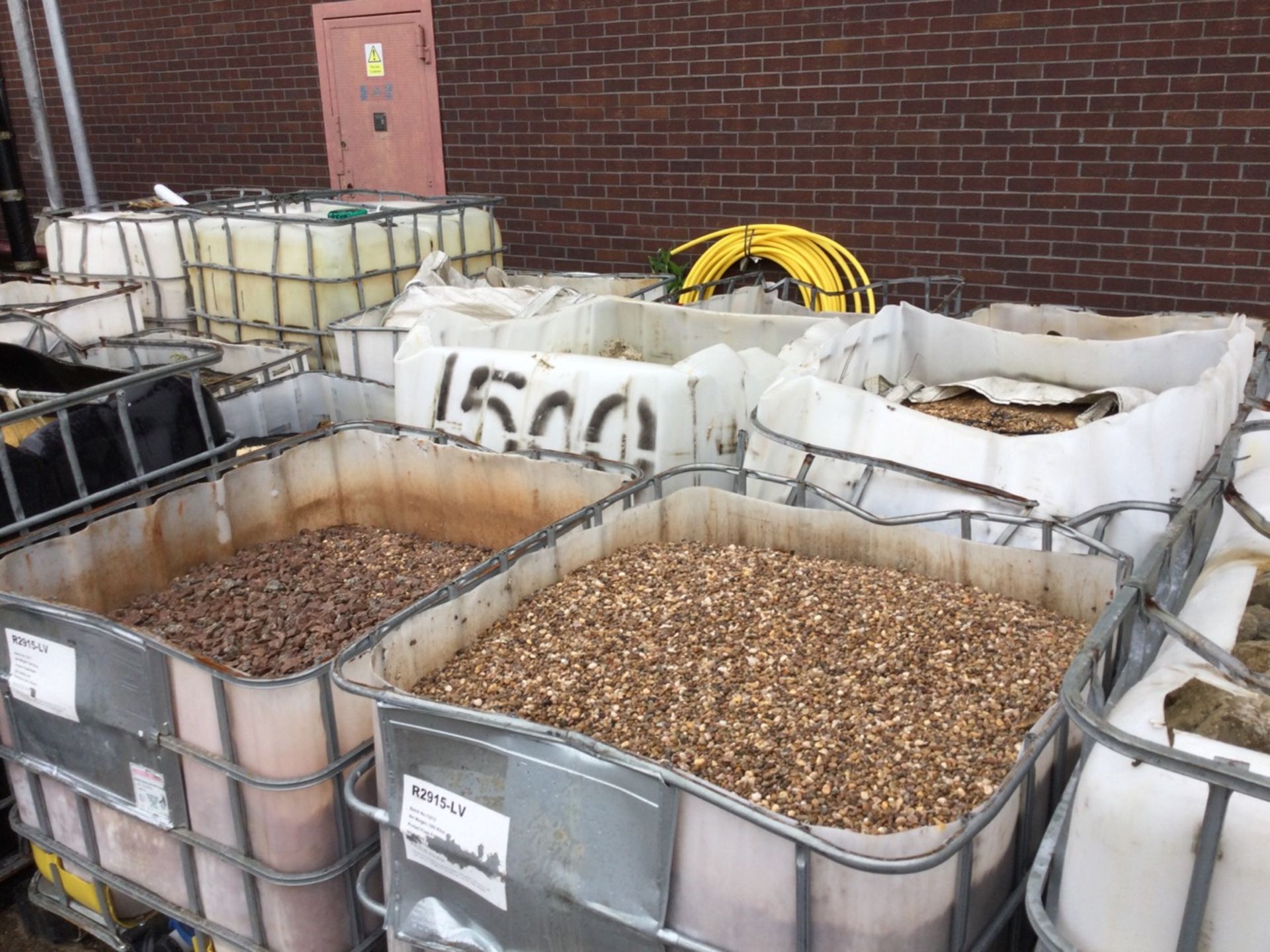 Approximately 35 Open IBC Containers Of Mixed Aggregate Suitable For Hard Core Or Other Building Pur