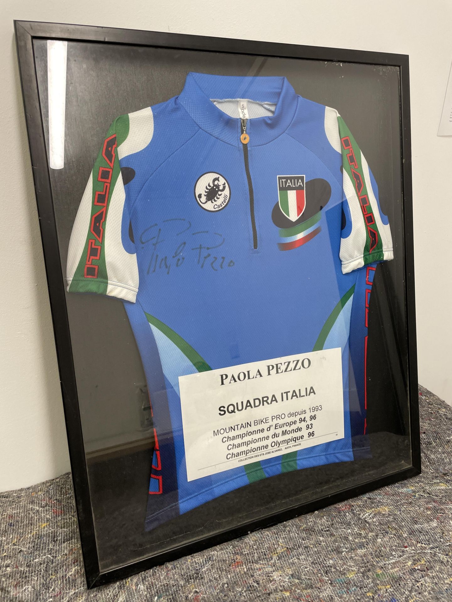 Paola Pezzo Framed & Signed Squadra Italia Jersey. Female Mountain Bike Champion of Europe 1994 & 95