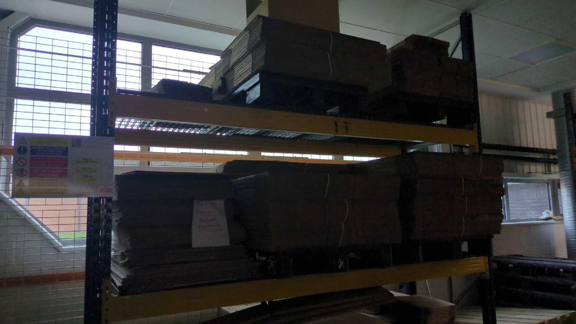 Quantity cardboard boxes on racking (racking excluded)