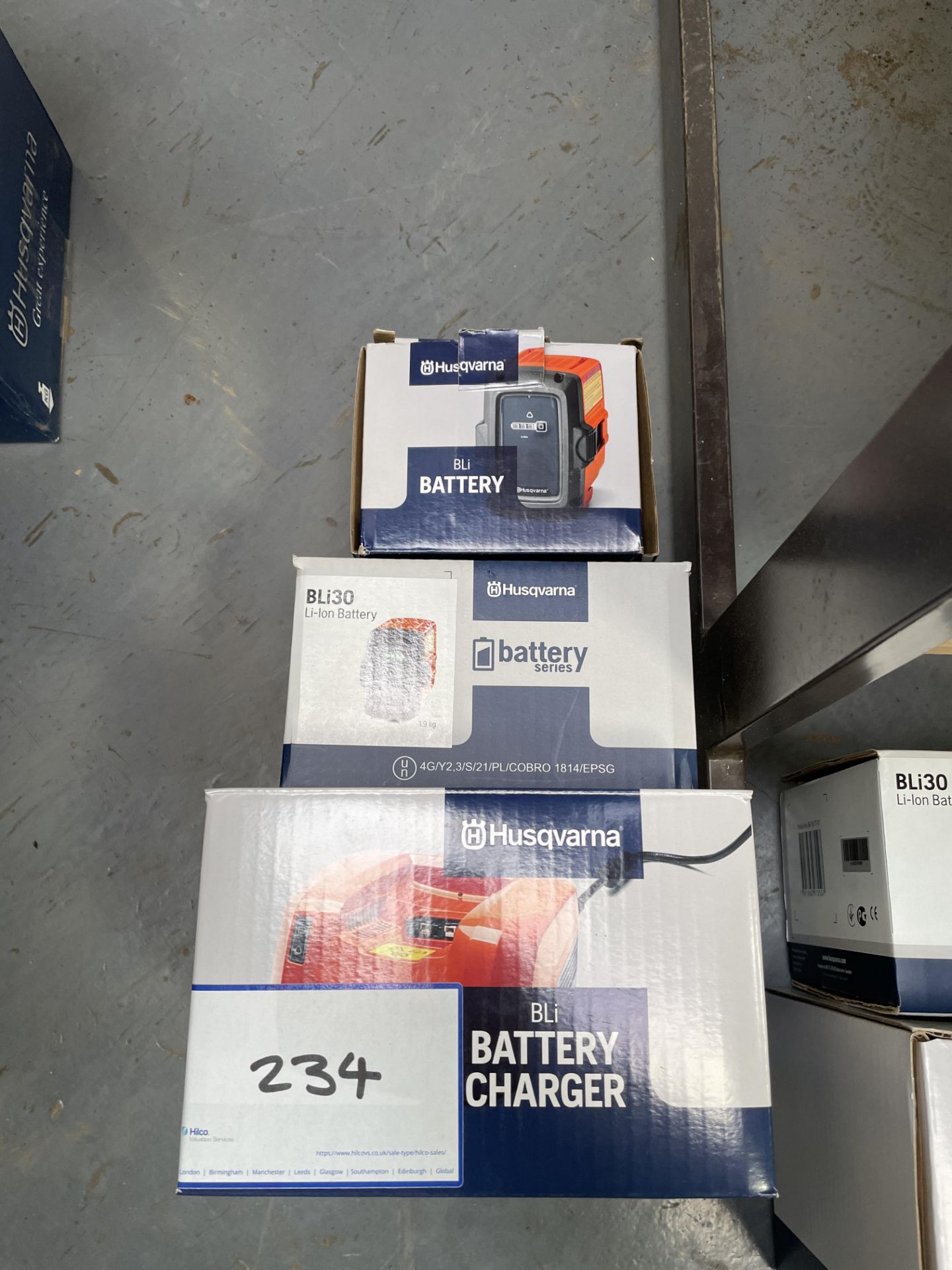 1: Husqvarna Bli Battery Charger with 1: BLi30 Battery & 1: BLi10 Battery (All Boxed) As Lotted