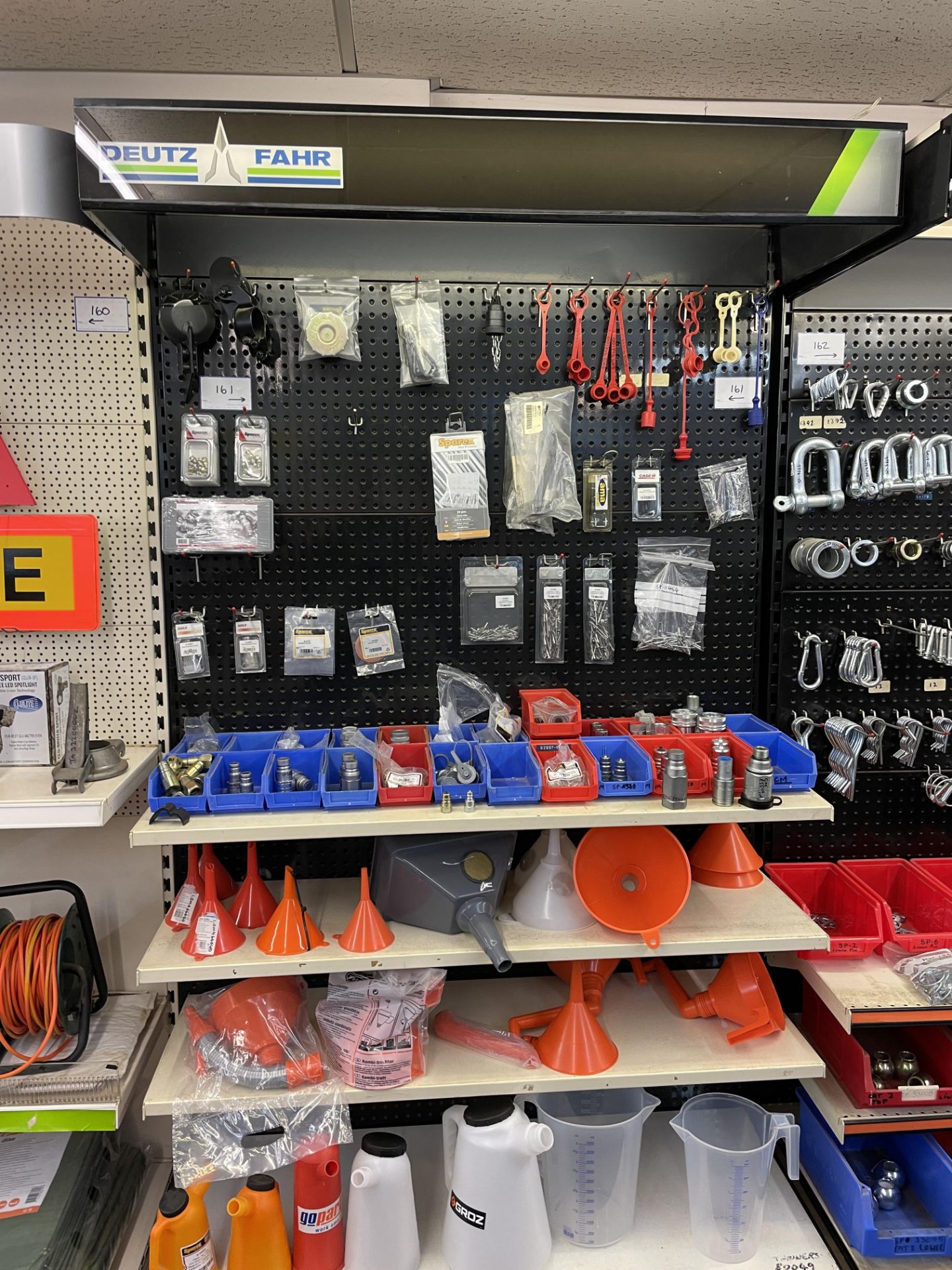 Contents of Display Unit to Include Fuel Caps, Allen Keys, Hopper Latches, Clevis Pins, Grease Fitti