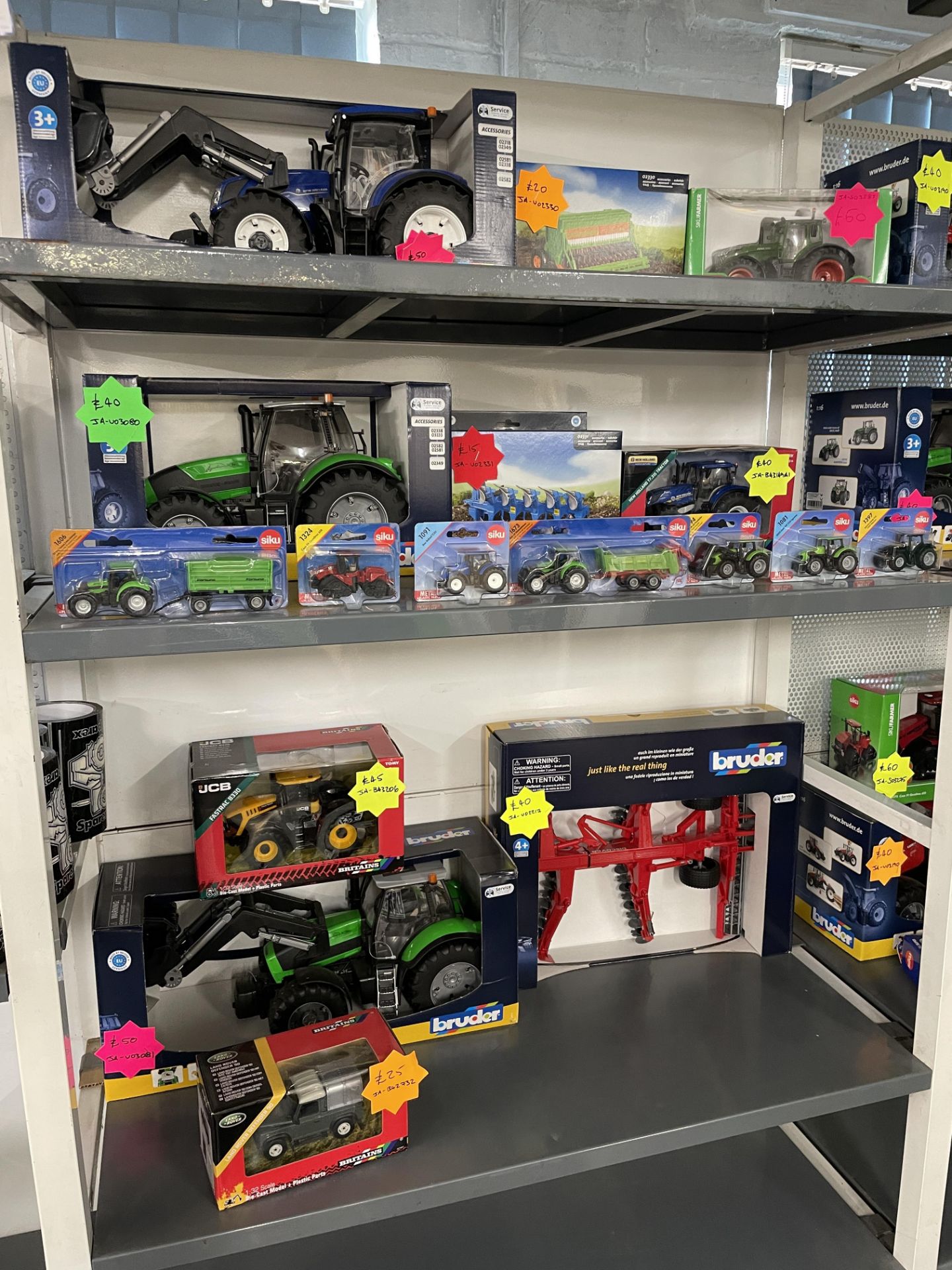 Contents of 2 Racks Approx 25 Boxed Models of Agricultural Vehicles As Lotted