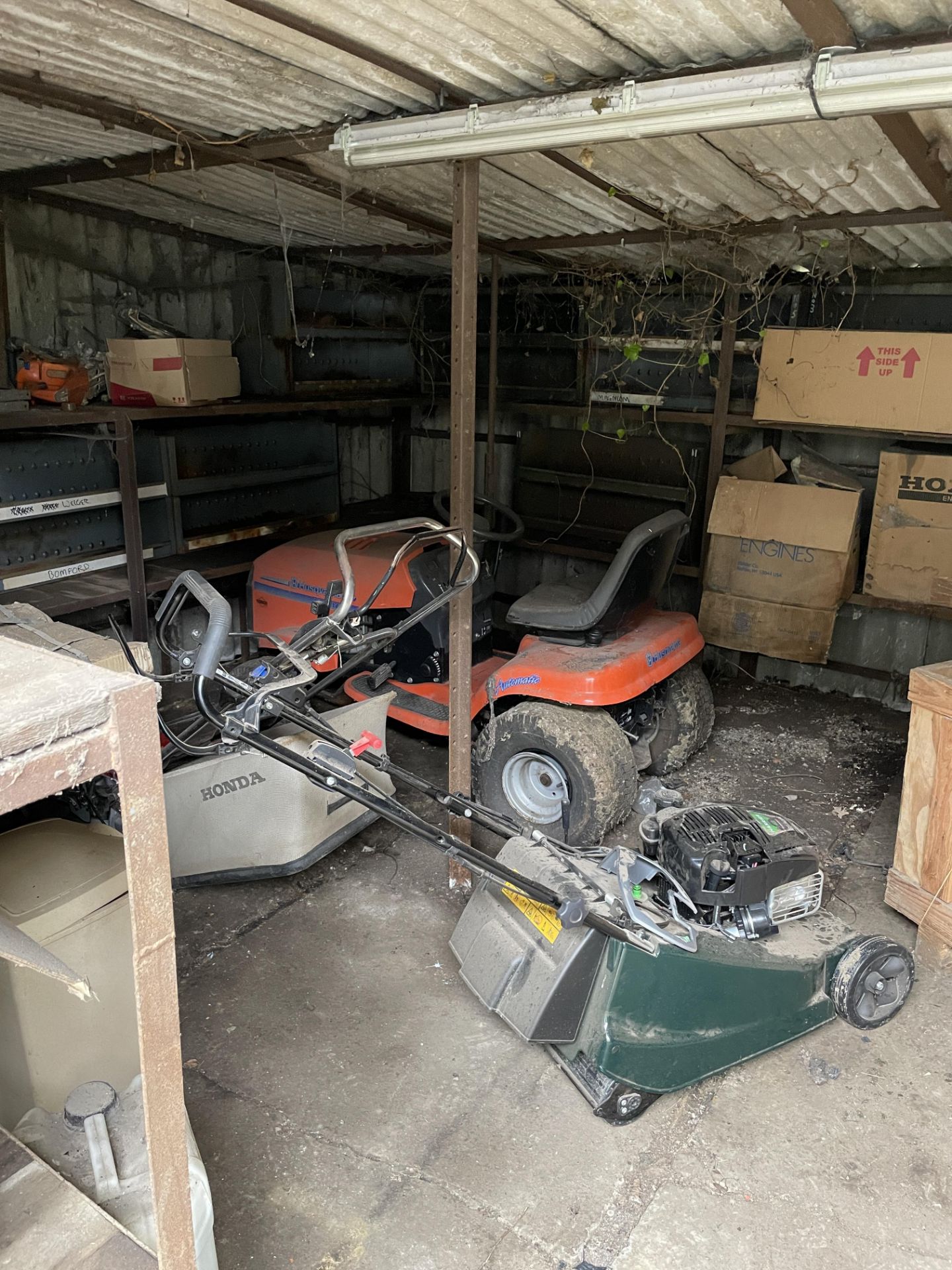 Contents of Lean To, including a Quantity of Redundant Garden Machinery: 2: Ride on Mowers, 3: Self