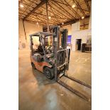 Toyota model 7FGCU25, 4900 lb. LP fueled forklift. S/N 67548, triple mast, solid tires, side shifter