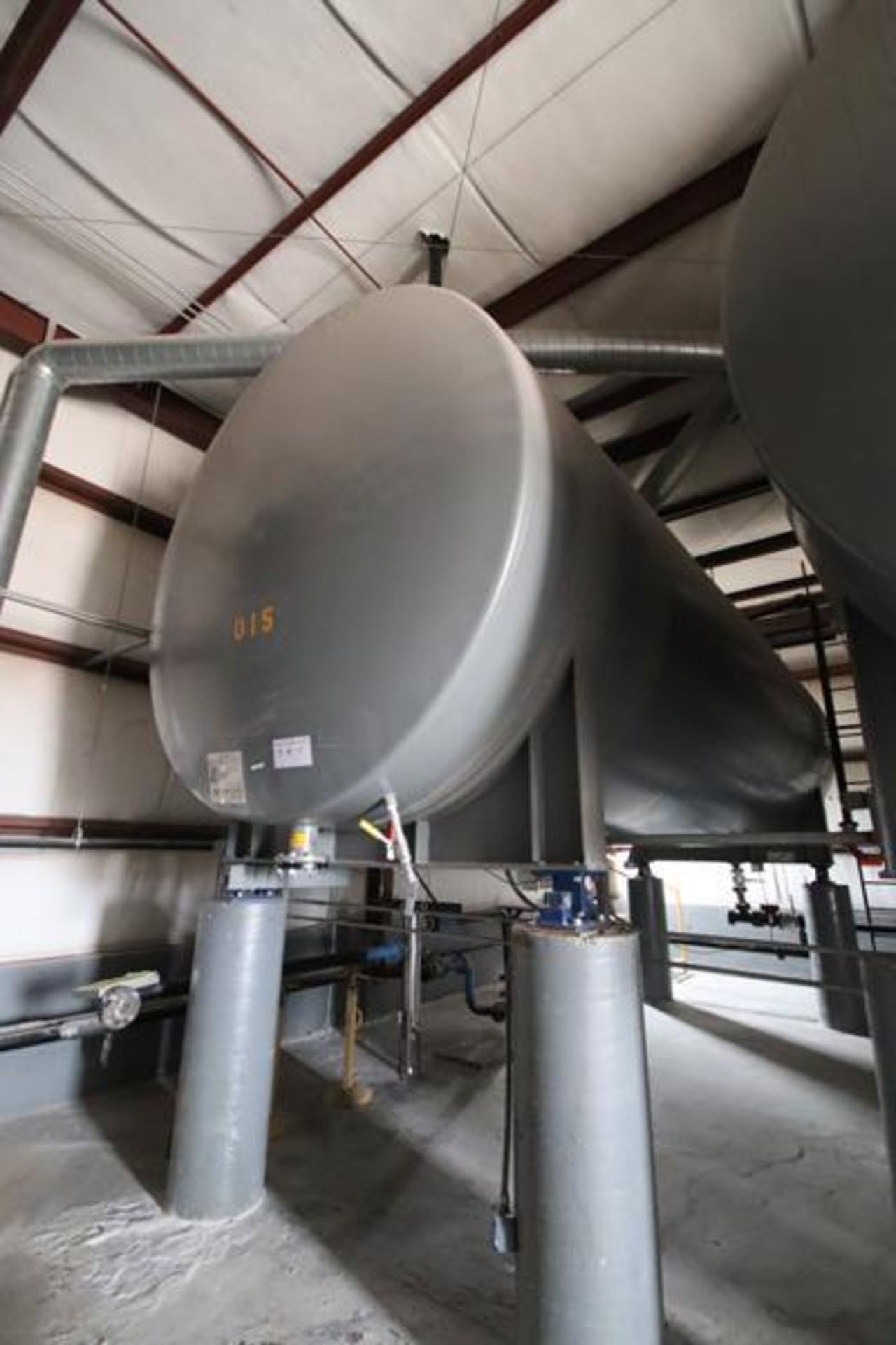 Approx. 10,000 gallon carbon steel horizontal storage tanks. Dished heads, on welded steel