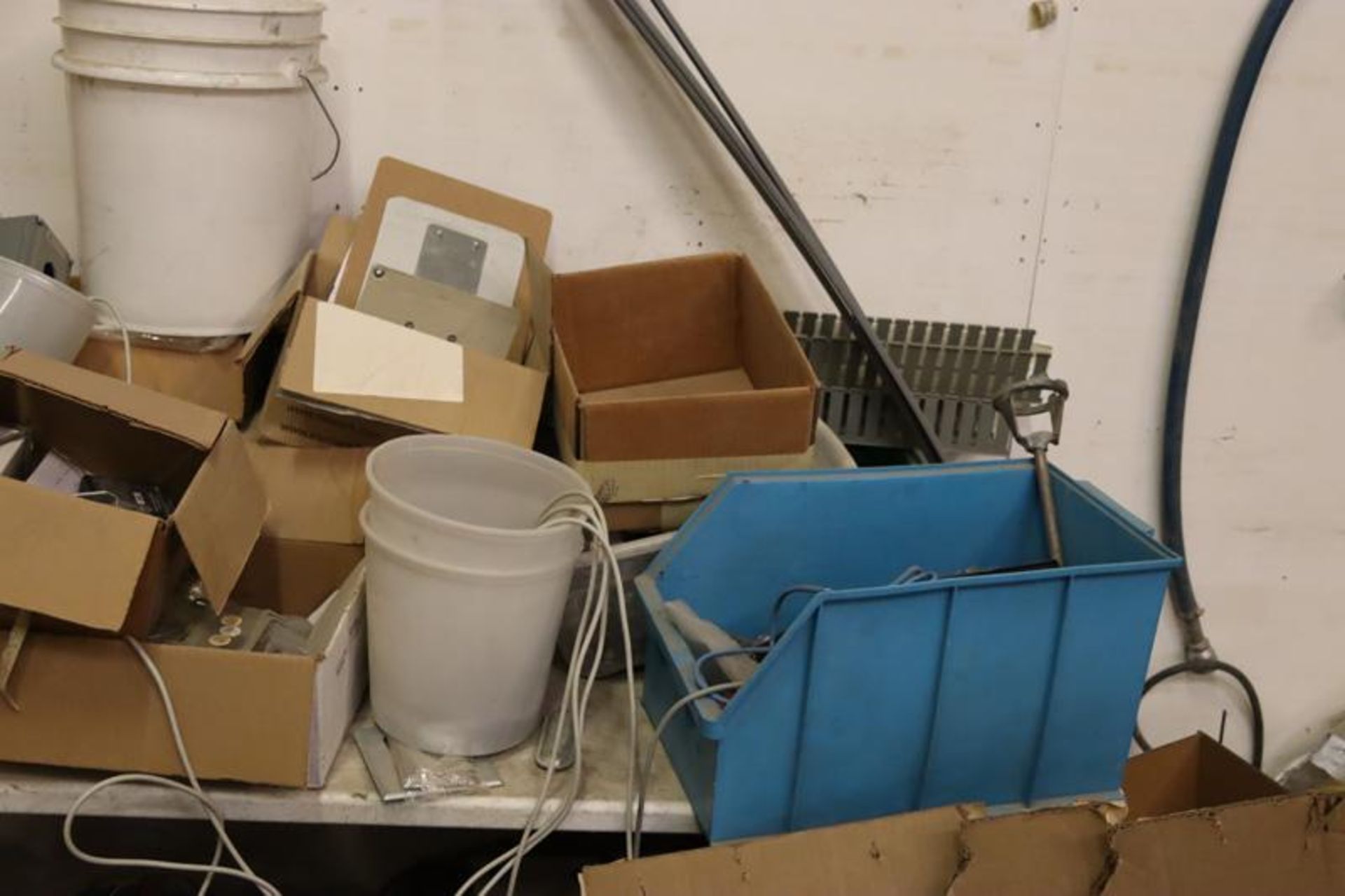 Folding Table and Skid with Contents-Communication Wire, Snake, Meter Pumps, Motos, Etc. - Image 4 of 6