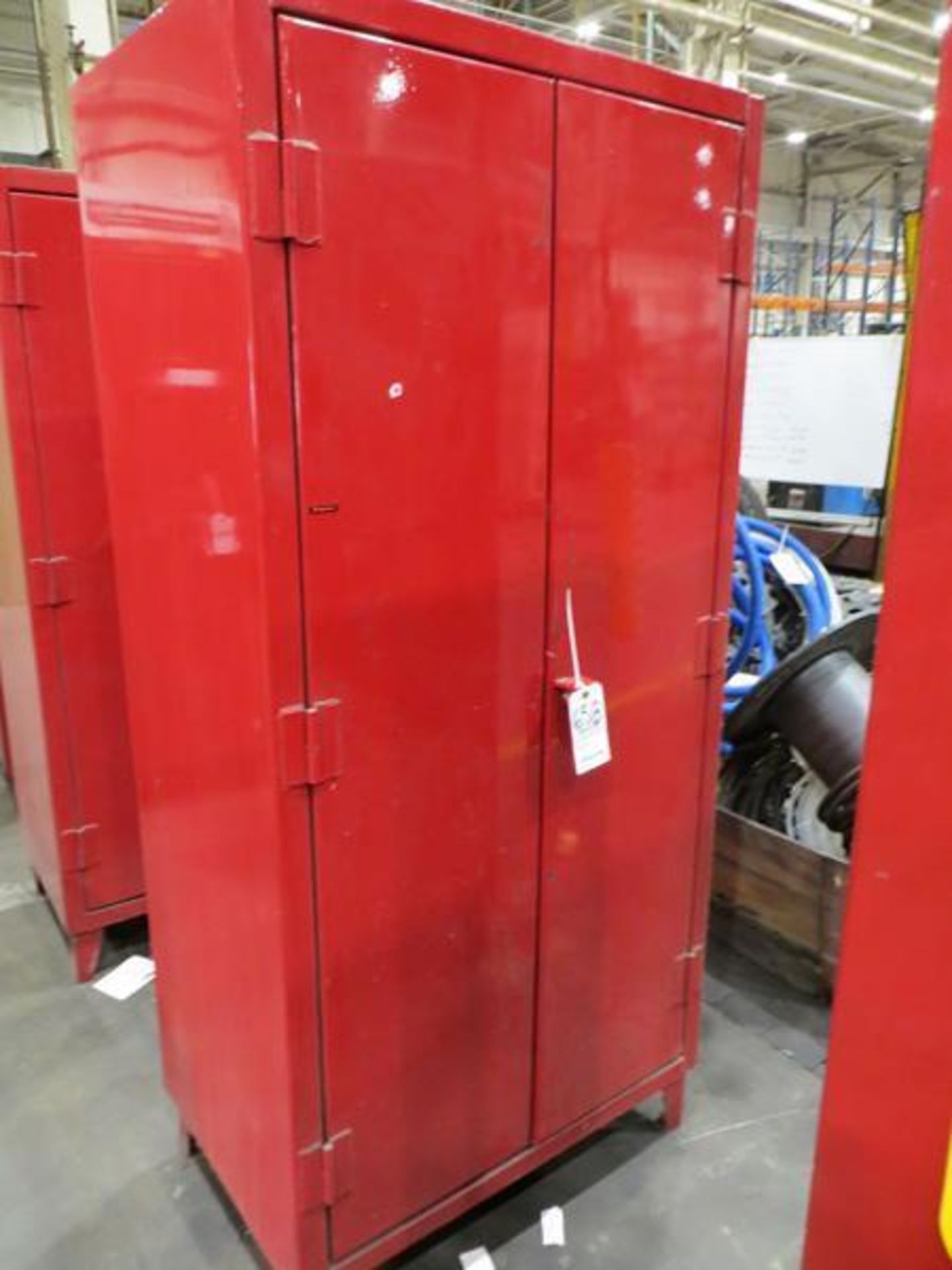 Hodge two door heavy duty cabinet plus contents