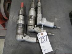 Three pneumatic drills