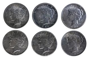 A GROUP OF UNITED STATES PEACE DOLLARS (6)