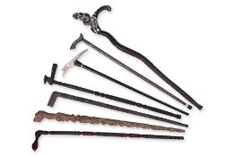 A GROUP OF SEVEN ASSORTED WALKING STICKS