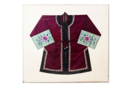 A CHINESE EMBROIDERED SILK JACKET
