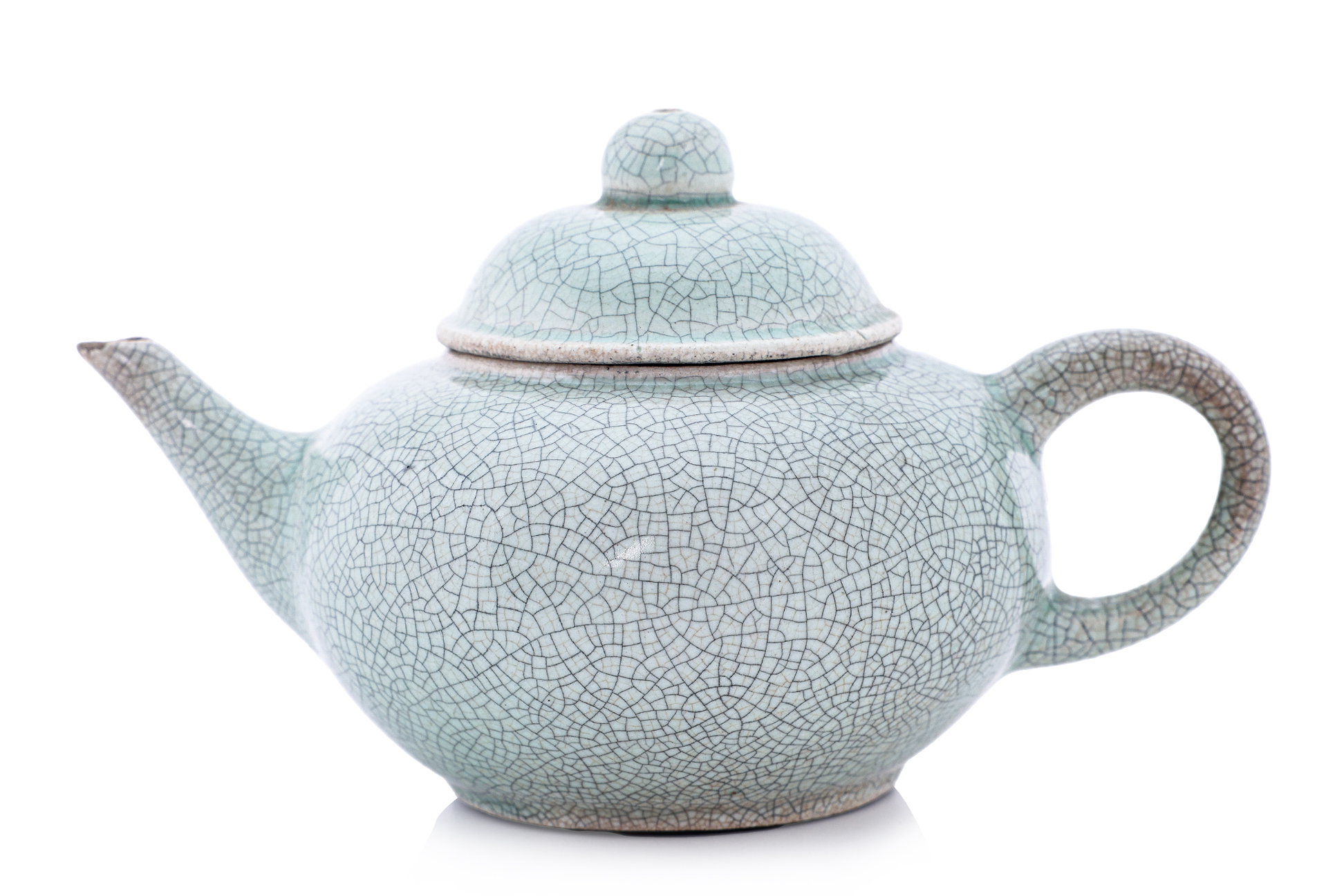 A SMALL CELADON TEAPOT