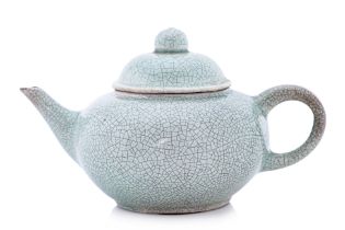 A SMALL CELADON TEAPOT