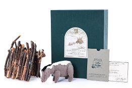 A LIMITED EDITION WINTERTIME EEYORE BY R. JOHN WRIGHT